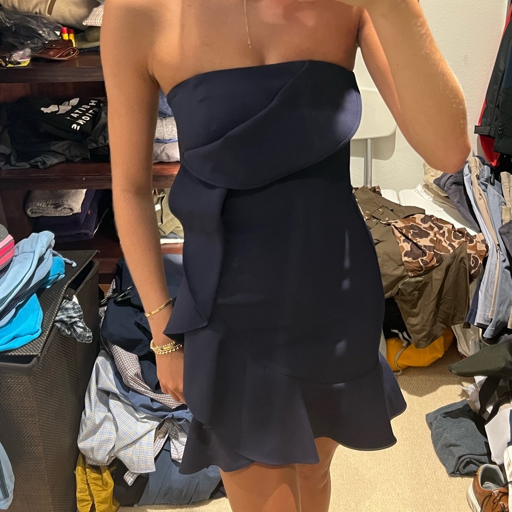 Likely navy dress